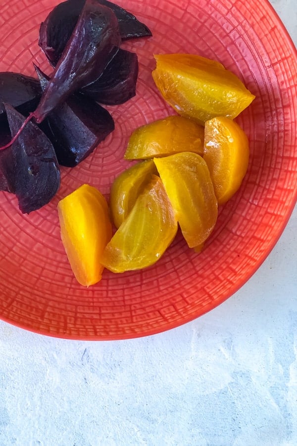 Red and Golden Beetroot on Tangerine Plate