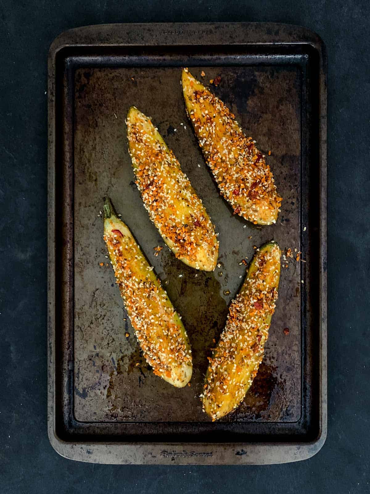 Dukkah Eggplant Baked Slices on a sheet pan