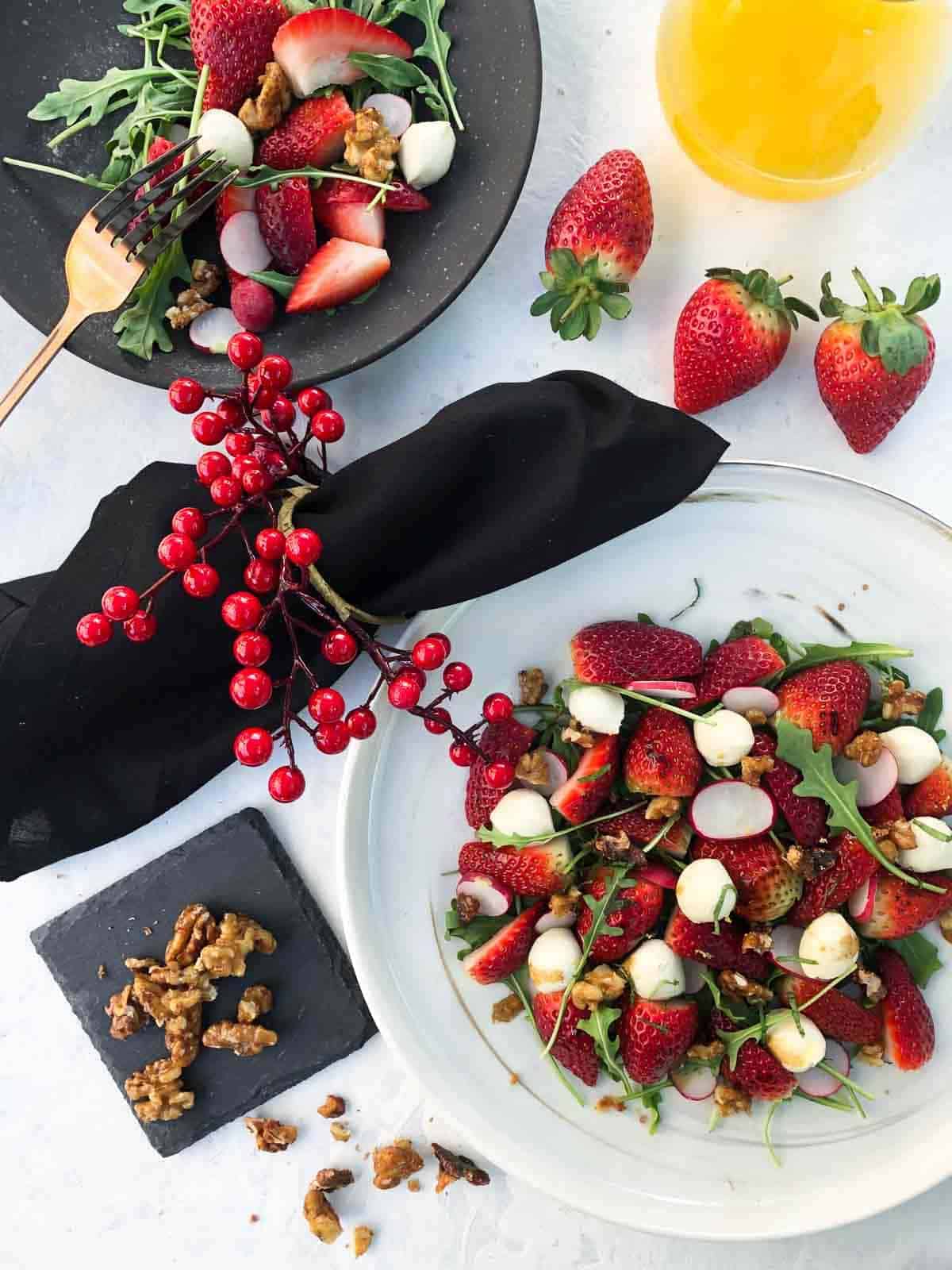 Christmas themed Summer Strawberry Salad with Bocconcini and Rocket with red berry decorations