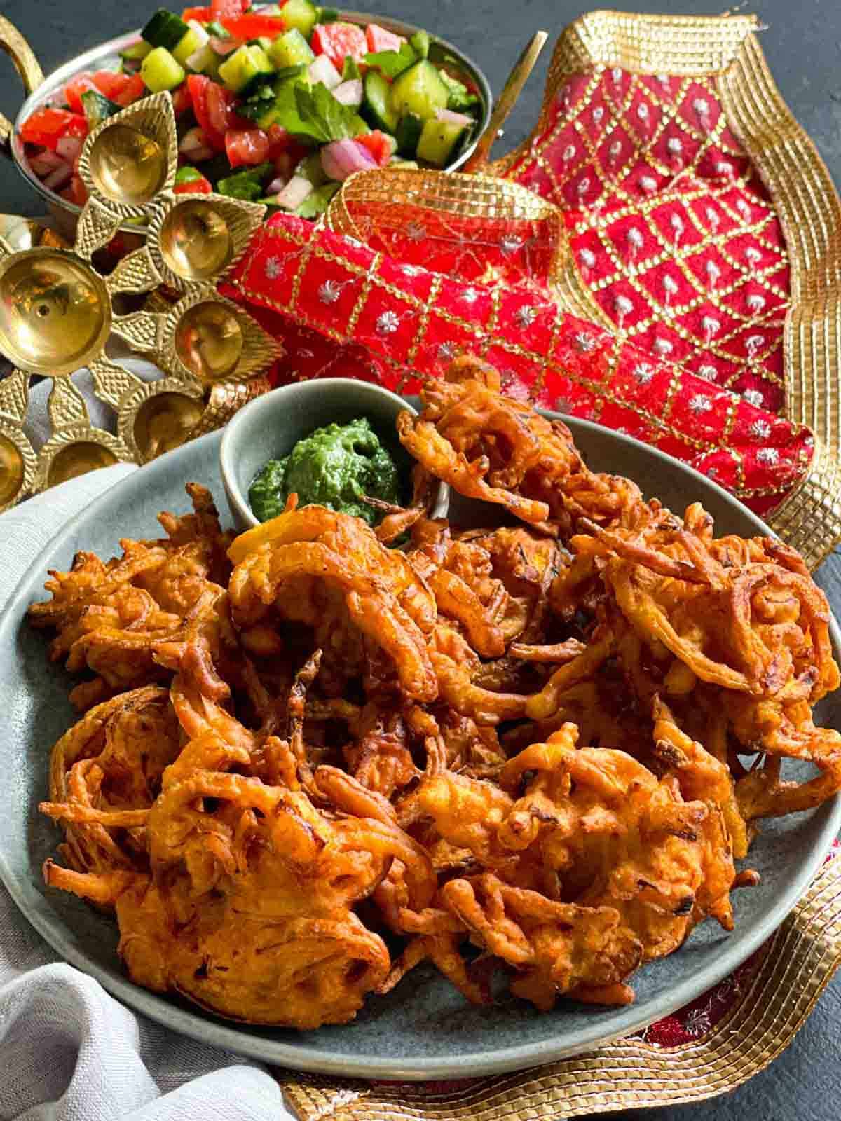 Diwali themed Onion Bhaji Recipe served with kachumber and coriander chutney