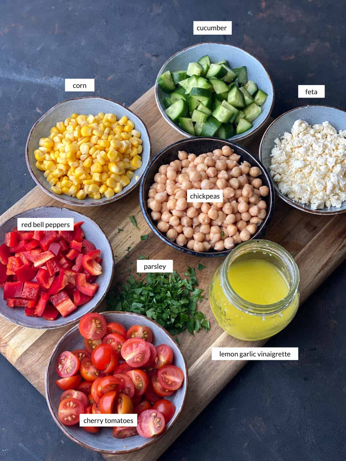 Individually labelled ingredients for Chickpea Salad with Feta