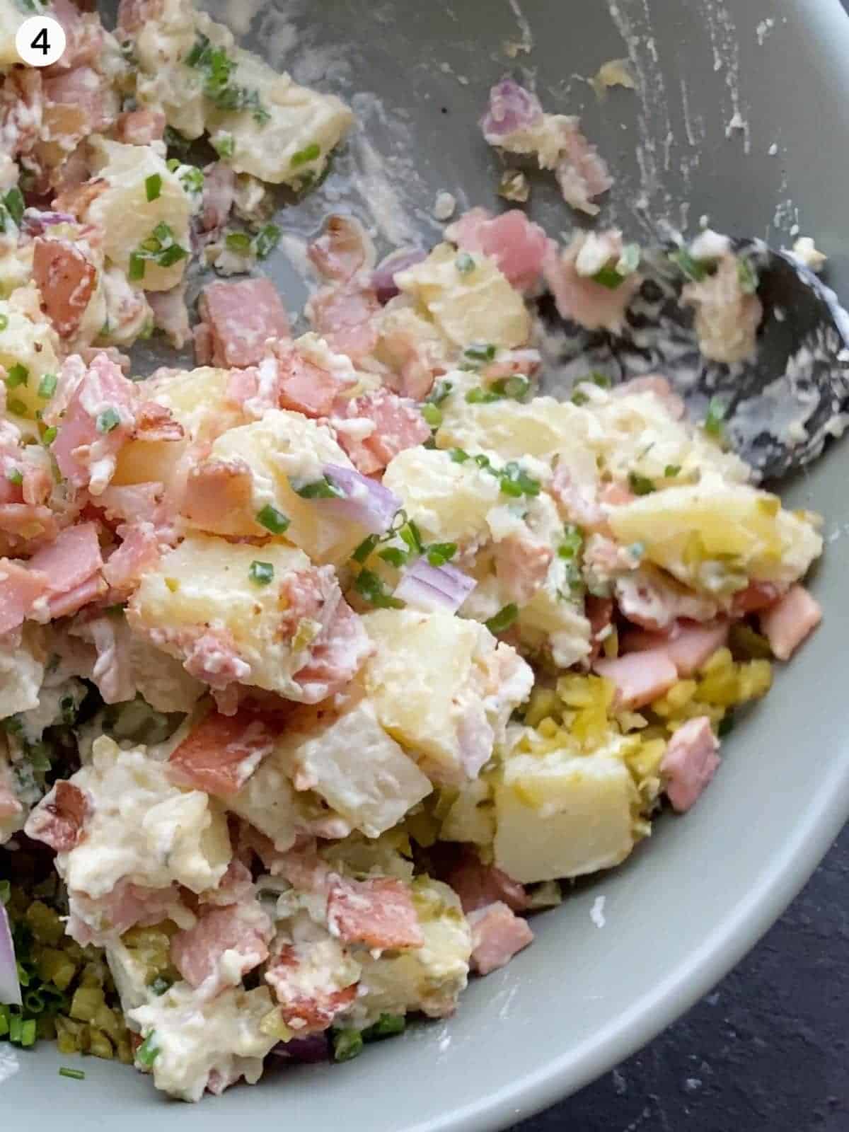 A mixing bowl of potato salad