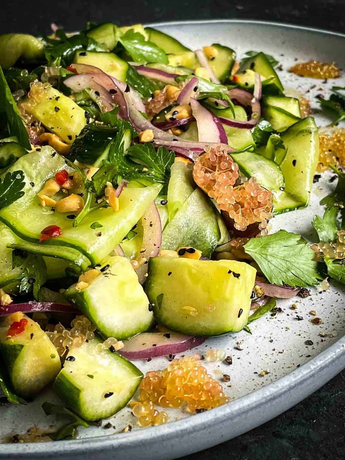 Cucumber Finger Lime Salad on a grey platter