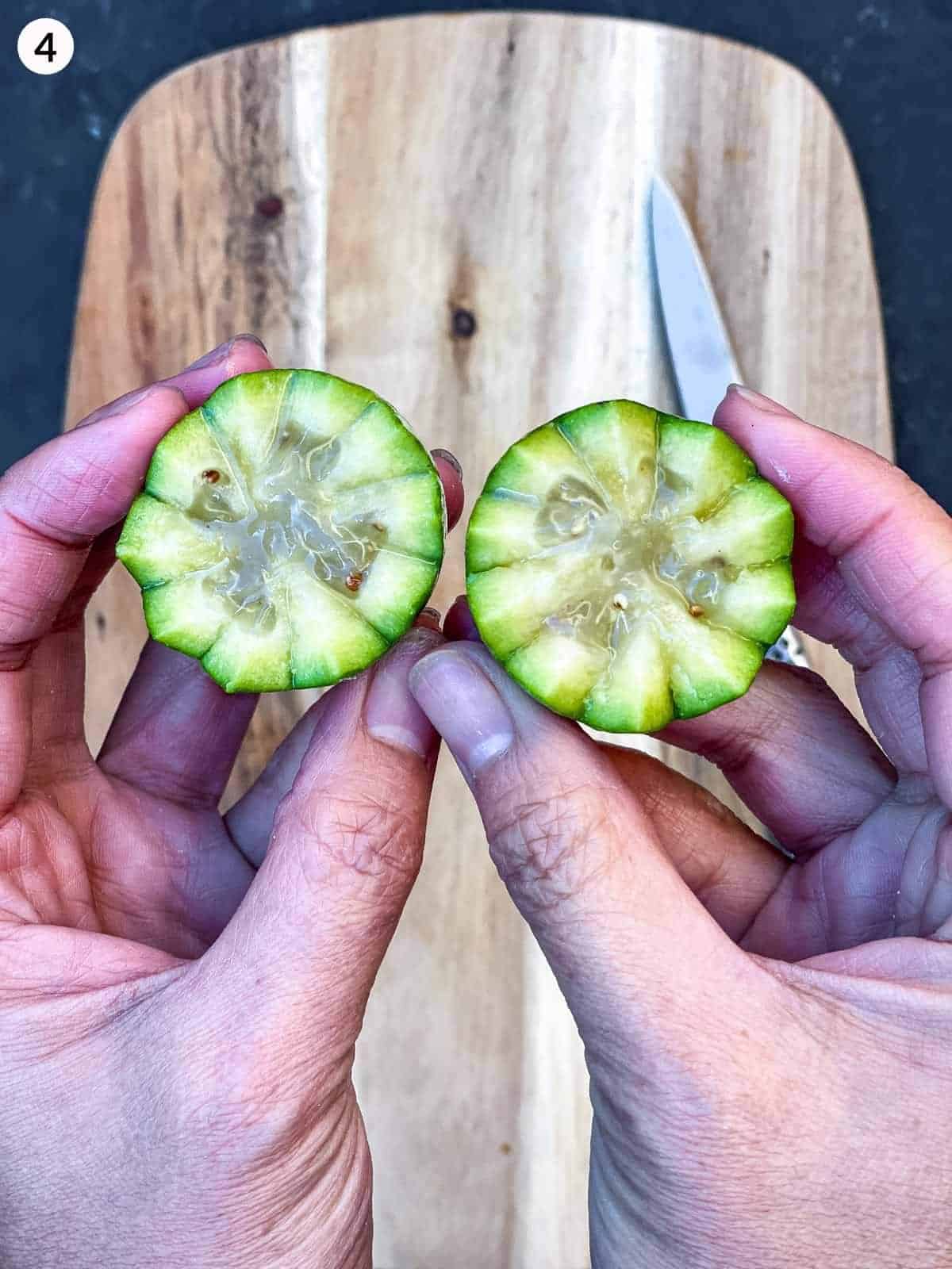 cutting feijoa flowers on a wooden board