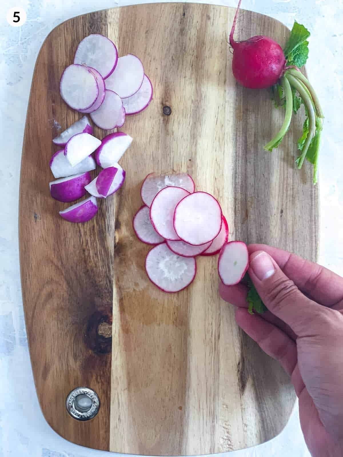 slices of radishes on a wooden board