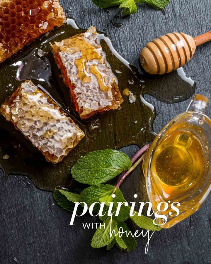 Image of honeycomb, honey twirler and jug of honey with some mint with the text overlay "pairings with honey"